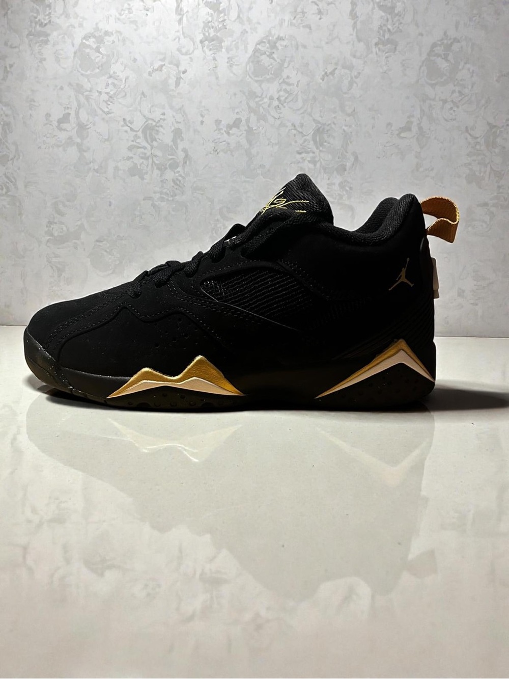 Jordan Low-Top Sneaker in Black & Gold Accent